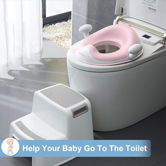 ANGELBLISS Baby Potty Training Toilet Seat with Soft Cushion Handles, Haute Collection, Double Anti-Slip Design and Splash Guard for Boys and Girls (Pink)
