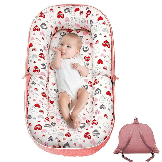Baby Lounger, Foldable Infant Nest Pillow with Soft Memory Foam Mat, Cover with Adorable Pattern, Converts to Backpack for Easy Travel, 0-12 Months, Pink
