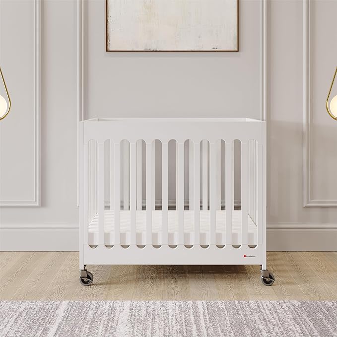 Foundations Boutique Folding Hotel Crib and Sheet Bundle - Includes Wooden Mini Crib with 3" Foam Mattress (White) and 6-Pack White Fitted Compact Sheets